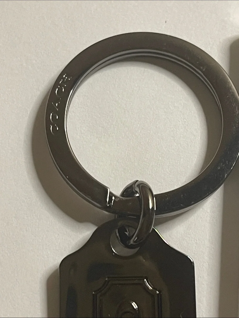Coach Gunmetal Key Tag With White Coach Pen